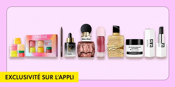 « EN EXCLUSIVITÉ SUR L’APPLI », Assortiment d’essentiels beauté comprenant un ensemble de soins pour la peau Laneige, un sérum capillaire, un parfum, un essentiel pour les lèvres, un rouge à lèvres YSL, une crème hydratante et deux flacons format voyage, l