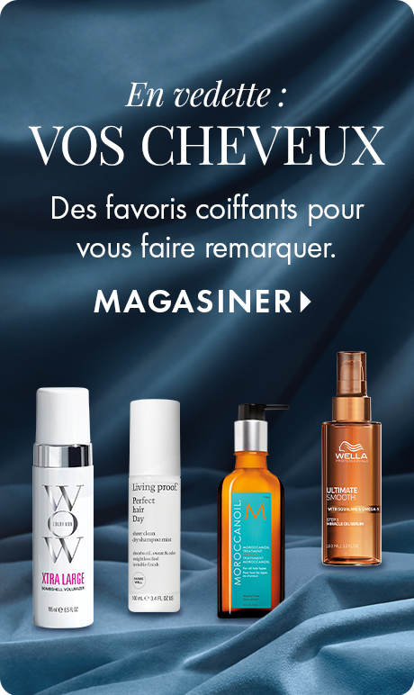 « En vedette : VOS CHEVEUX » « Des favoris coiffants pour vous faire remarquer. » « MAGASINER » Quatre soins pour les cheveux présentés sur un tissu drapé bleu, y compris des essentiels coiffants Color Wow, Living Proof, Moroccanoil et Wella.