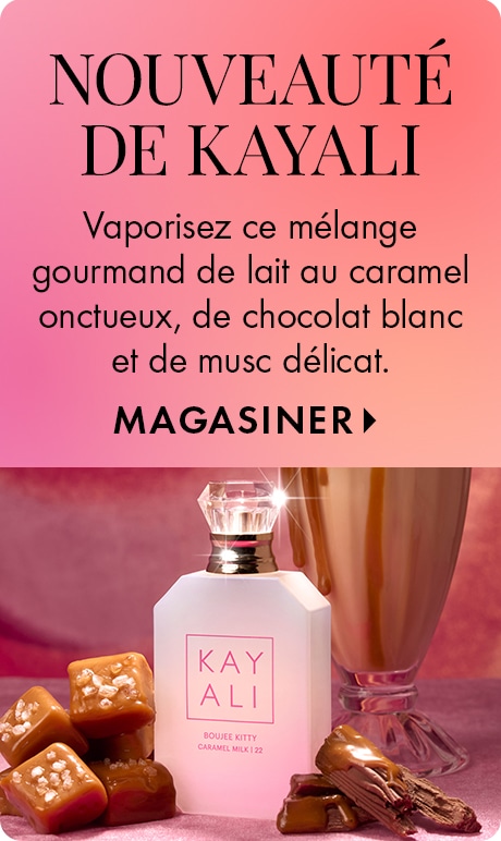 Fond dégradé rose avec texte « Nouveauté Kayali » et « Laissez-vous charmer par ce mélange irrésistible de lait au caramel onctueux, de chocolat blanc et de musc doux » plus « Magasiner ». Un flacon de parfum Kayali est présenté avec des bonbons au caramel