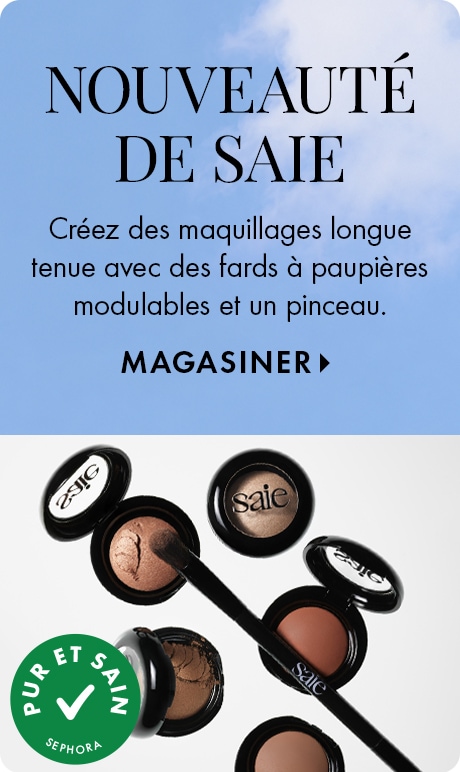« NOUVEAUTÉ DE SAIE. » Texte : « Créez des maquillages longue tenue avec des fards à paupières modulables et un pinceau. » « MAGASINER. » Fond bleu ciel au-dessus de pots de fards à paupières ouverts Saie, d’un pinceau à maquillage et d’un badge à coche ve