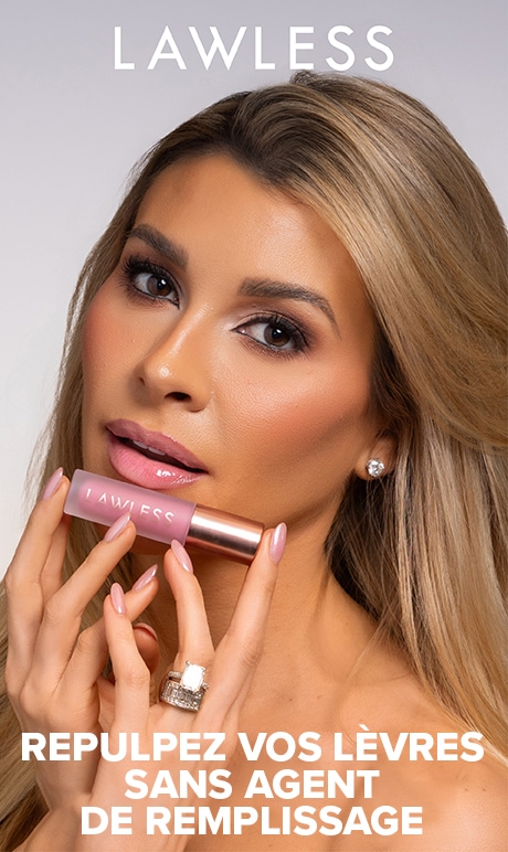 Lawless. Oubliez les agents de remplissage et dorlotez vos lèvres. Fondatrice tenant le produit.