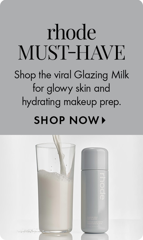 Image for rhode Glazing Milk. Text reads: “Shop the viral Glazing Milk for glowy skin and hydrating makeup prep. SHOP NOW.” Shows a bottle labeled “rhode” next to a glass being filled with white liquid.