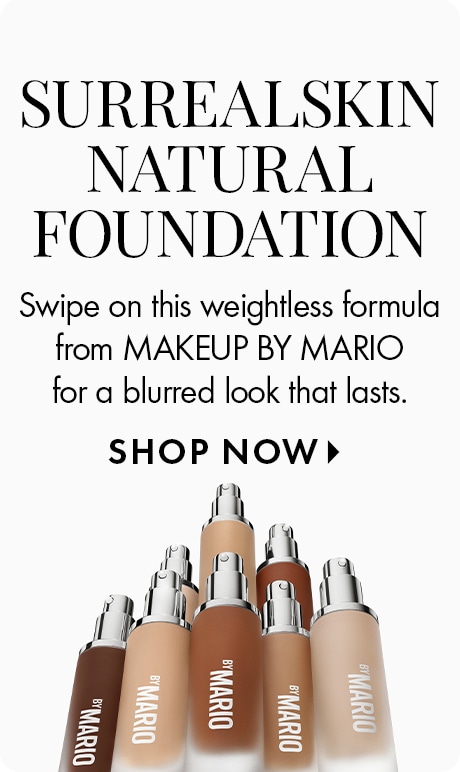 Seven bottles of MAKEUP BY MARIO foundation in various shades are shown. Text reads: “Swipe on this weightless formula from MAKEUP BY MARIO for a blurred look that lasts. SHOP NOW.” 