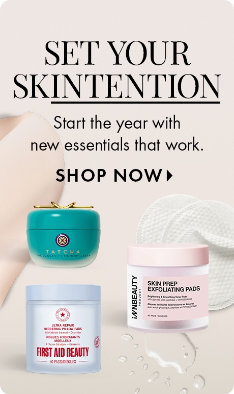 Text on a beige background reads: “Set Your Skintention. Start the year with new essentials that work. Shop Now.” Below are Tatcha cream in a teal jar, First Aid Beauty hydrating pads in a blue jar, and INNBeauty exfoliating pads in a pink jar.