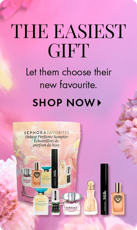 Pink and purple gradient with soft floral accents. Text reads “The easiest gift” and “Let them choose their new favourite.” A Sephora Favorites Deluxe Perfume Sampler pouch is shown with several mini fragrance bottles and a “Shop Now” prompt.