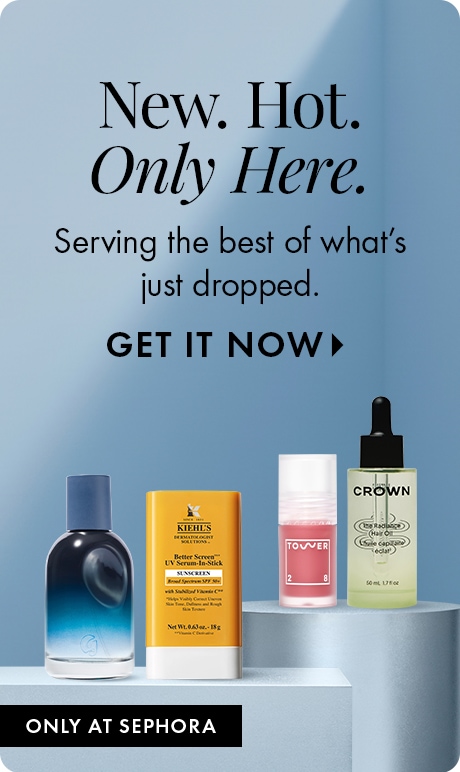Blue gradient background with text reading “New. Hot. Only Here.” and “Serving the best of what’s just dropped,” followed by “Get It Now.” Four beauty products sit on a display platform above a label reading “Only at Sephora.”
