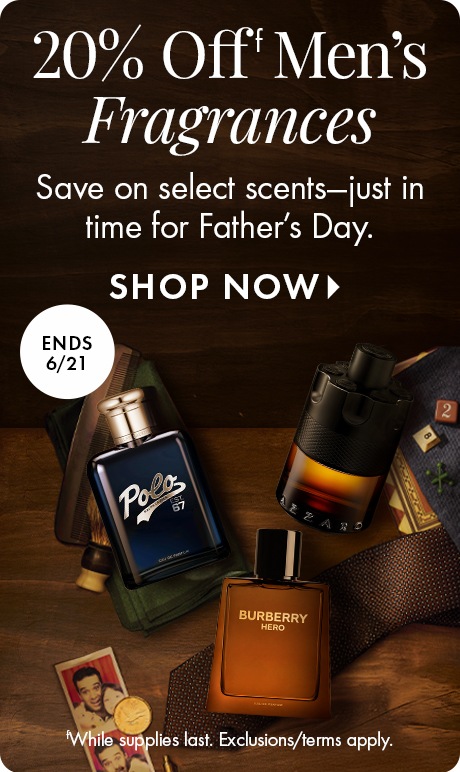 Dark wood background with text reading “20% Off Men’s Fragrances” and “Save on select scents—just in time for Father’s Day,” plus “SHOP NOW.” A circle reads “Ends 6/21.” Three fragrance bottles (Polo, Burberry Hero, Prada) sit with grooming items.