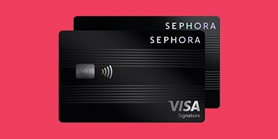 Sephora credit card on pink background with yellow badge showing “8% – 12% back,” with 8% struck through; black Visa Signature card with contactless symbol displayed.