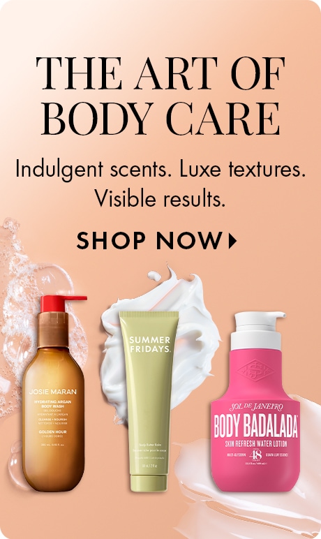 "THE ART OF BODY CARE" "Indulgent scents. Luxe textures. Visible results." "SHOP NOW" Peach-toned promotional banner featuring body care products from Josie Maran, Summer Fridays, and Sol de Janeiro surrounded by lotion and water splash accents.