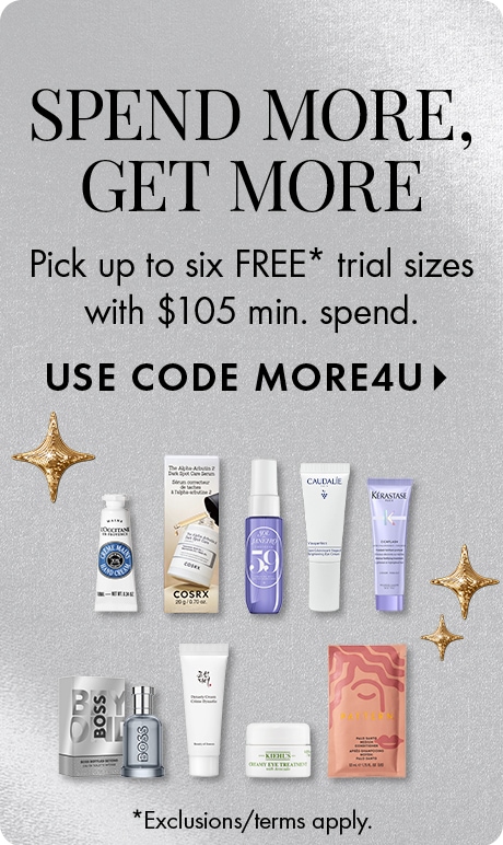 "SPEND MORE, GET MORE." Text: "Pick up to six FREE* trial sizes with $105 min. spend." "USE CODE MORE4U." Silver background with sample-size beauty products and gold star accents. Text at bottom: "*Exclusions/terms apply."