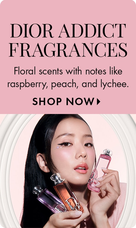 Text on a pink background reads: “Dior Addict Fragrances. Floral scents with notes like raspberry, peach, and lychee. Shop Now.” Below are three Dior perfume bottles in shades of purple, pink, and peach, displayed inside an oval frame.