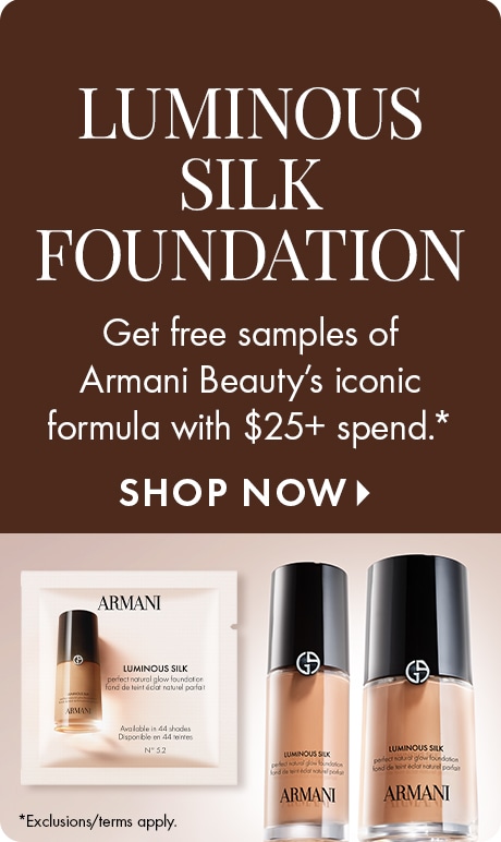 Brown background with large text reading “Luminous Silk Foundation.” Below, text says “Get free samples of Armani Beauty’s iconic formula with $25+ spend.” Image shows two Armani foundation bottles and a sample packet, with a “Shop Now” prompt.