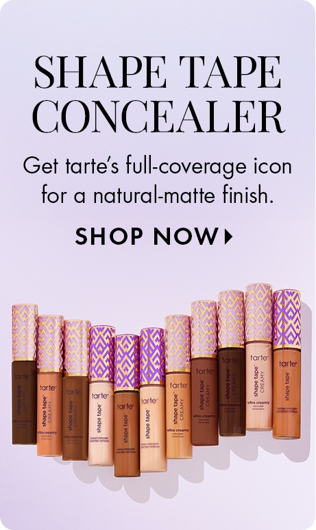 Lilac background with text: “Shape Tape Concealer. Get tarte’s full‑coverage icon for a natural‑matte finish. Shop Now.” Below is a lineup of Tarte Shape Tape concealers in multiple shades with patterned purple‑and‑gold caps.