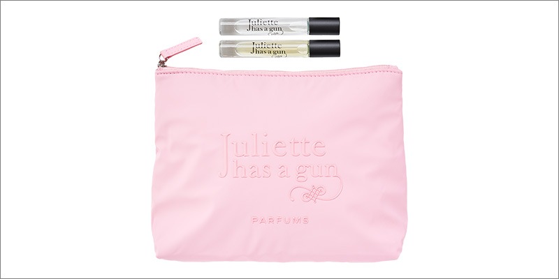Juliette has a gun pink pouch and two travel size fragrances