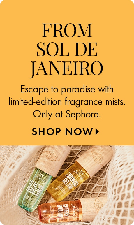 Warm yellow background with text reading “From Sol de Janeiro.” Below: “Escape to paradise with limited‑edition fragrance mists. Only at Sephora,” and “Shop Now.” Three Sol de Janeiro mist bottles with wooden caps rest on a netted fabric at the bottom.