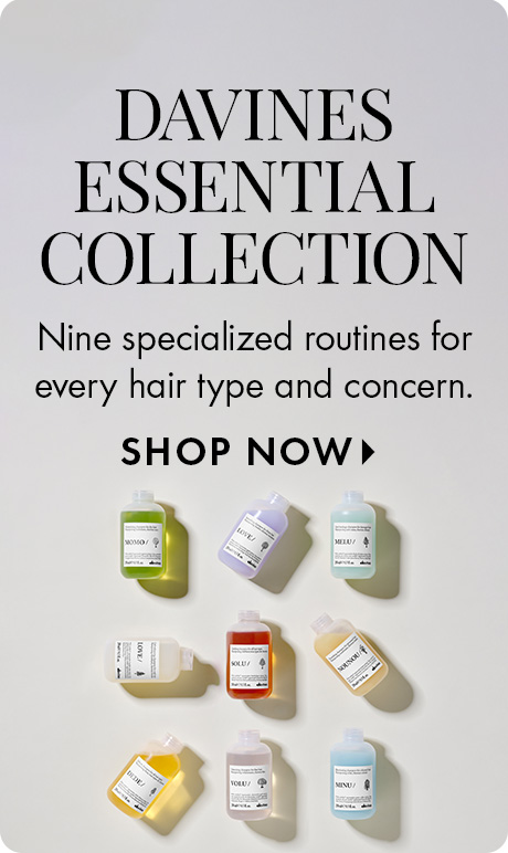 Light gray background with text reading “Davines Essential Collection” and “Nine specialized routines for every hair type and concern,” followed by “Shop Now.” Nine small Davines hair care bottles in different colors are neatly arranged in a grid below.