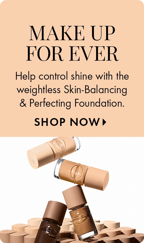 Beige background with text reading “Make Up For Ever” and “Help control shine with the weightless Skin‑Balancing & Perfecting Foundation,” followed by “Shop Now.” Multiple foundation bottles are stacked and arranged in different shades.