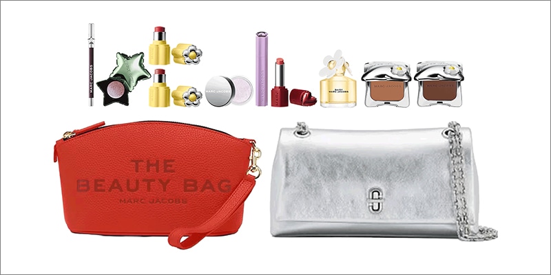 Wide product image on light background: assorted Marc Jacobs makeup items displayed above a red pouch labeled “THE BEAUTY BAG,” next to a metallic silver shoulder bag with chain strap.