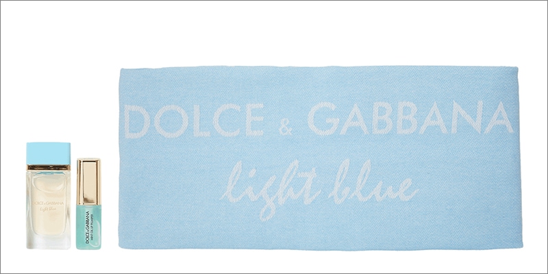Dolce & Gabbana Light Blue fragrance set including a perfume bottle, mini spray, and blue pouch with “Dolce & Gabbana light blue” text.