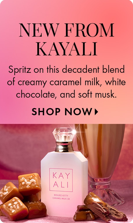 Pink gradient background with text reading “New from Kayali” and “Spritz on this decadent blend of creamy caramel milk, white chocolate, and soft musk,” plus “Shop Now.” A Kayali perfume bottle is shown with caramel candies and a milkshake glass.