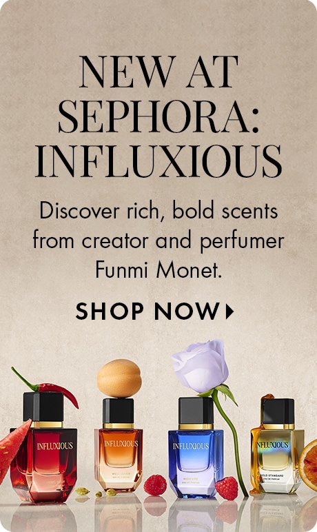 "NEW AT SEPHORA: INFLUXIOUS Discover rich, bold scents from creator and perfumer Funmi Monet. SHOP NOW" Beige ad with four perfume bottles at bottom, accented by a red chili pepper, pale flower, raspberries, and citrus slice.