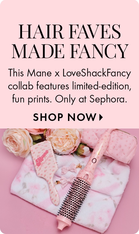 "HAIR FAVES MADE FANCY" "This Mane x LoveShackFancy collab features limited-edition, fun prints. Only at Sephora." "SHOP NOW" Pink promotional layout above a styled product photo with floral-patterned hair tools, flowers, and soft pink accessories.