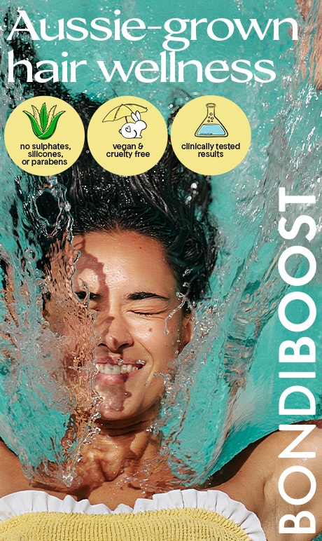 Aussi Grown Hair Wellness. Bondi Boost. Image of model in water.