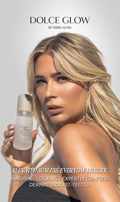 Dolce Glow by Isabel Alysa. Elevated sunless everyday luxury. Natural-looking. Expertly crafted. Dermatologist Tested. Image of model holding product.
