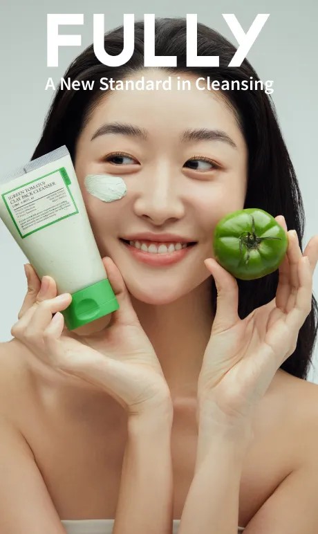 fully. a new standard in cleansing. image of model holding products. 
