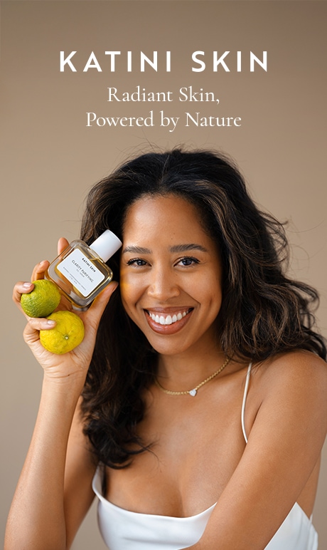 Katini Skin. Radiant Skin, Powered by Nature. Image of model of holding product.