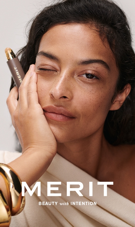 Merit. Beauty with Intention. Image of model with product.