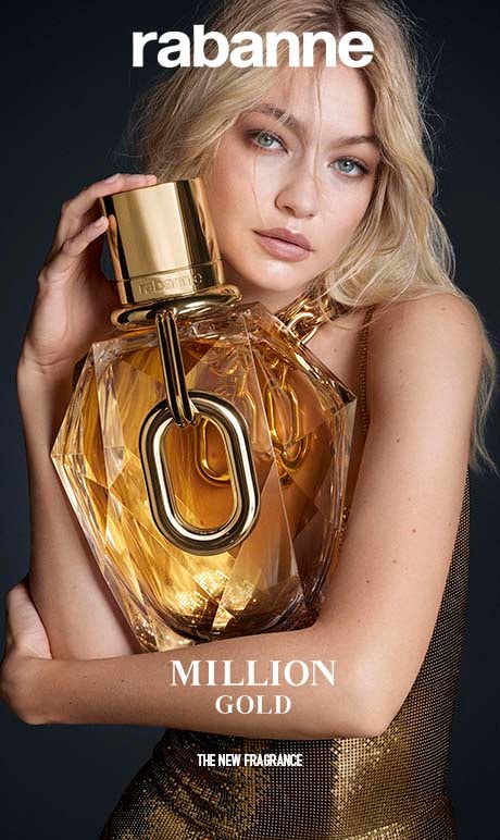 Rabanne. Million Gold. The New fragrance. Image of model holding fragrance bottle.
