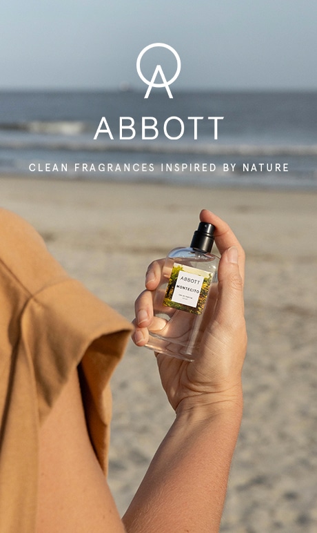 abbott. clean fragrance inspired by nature. model holding product bottle. 