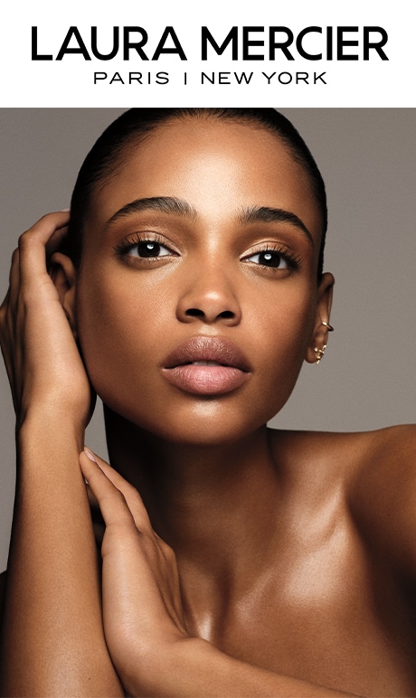 Laura Mercier Paris | New York | model with subtle makeup posing with hand on face