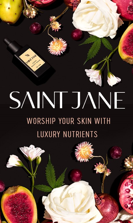 Saint Jane. Worship Your Skin With Luxury Nutrients. Flowers and bottle of product