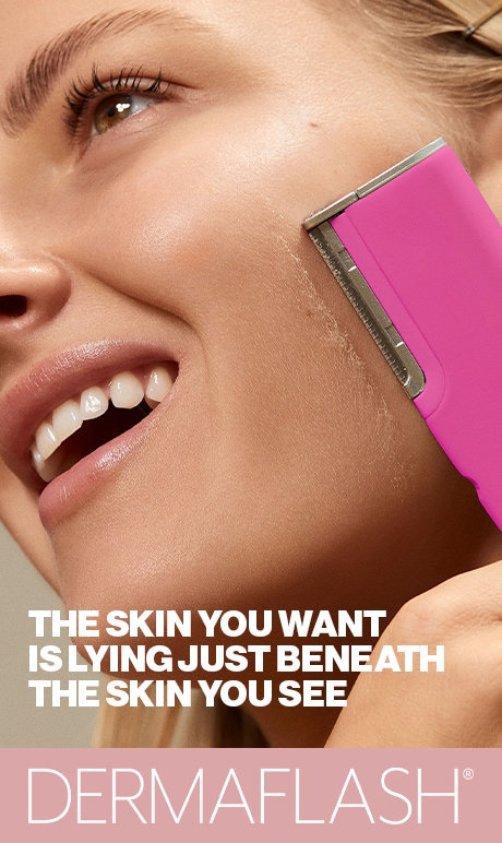 The skin you want is lying just beneath the skin you see. Dermaflash | woman model applying a Dermaflash tool to her skin