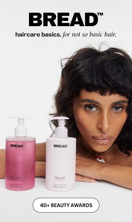 bread. haircare basics. for not so basic hair. 40+ beauty awards. Image of model with product.
