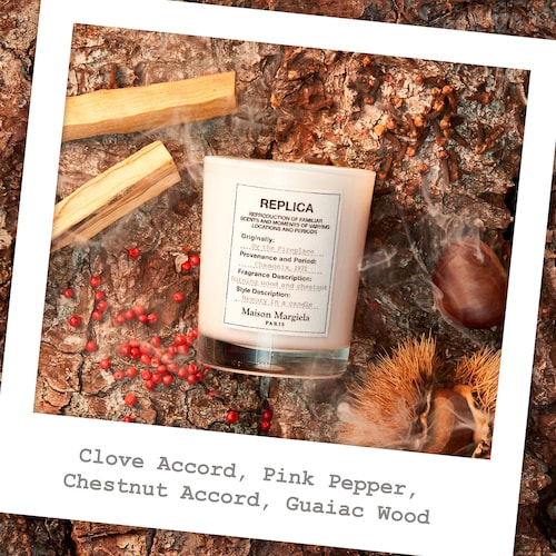 The Fireplace Scented Candle is a popular item from the REPLICA brand, cherished by candle lovers worldwide. This carefully crafted scented candle aims to evoke the cozy ambiance and nostalgic memories of gathering around a crackling fireplace. 