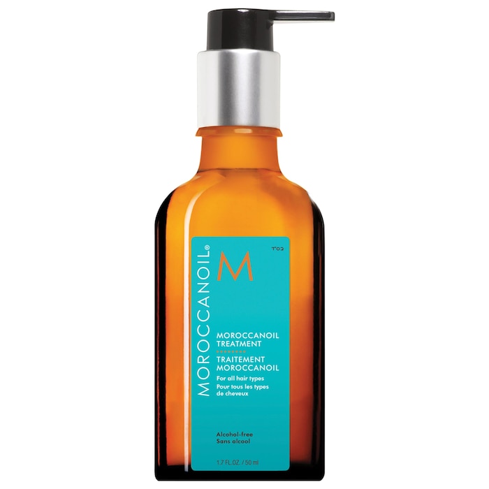 Teal Moroccanoil treatment bottle